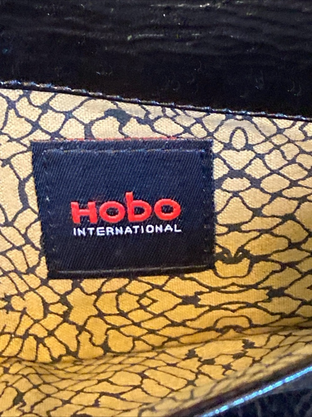 HOBO Black Patent Fold-Over Clutch with Diagonal Zip Magnetic Closure - Picture 10 of 15